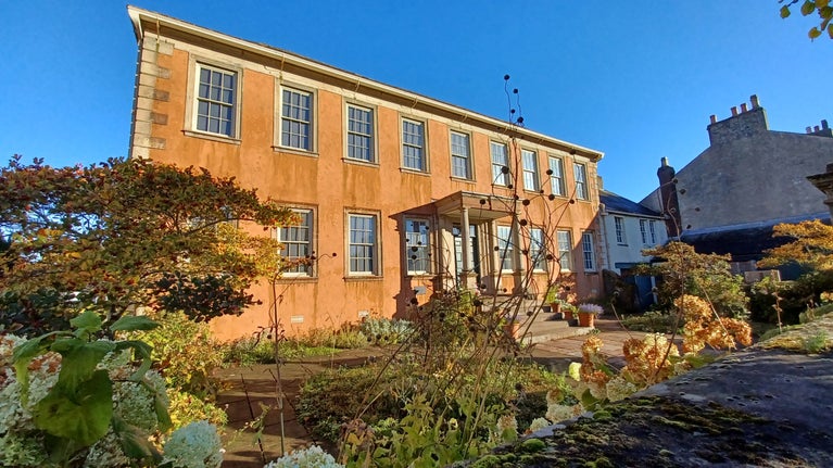 Front exterior of a Georgian Townhouse in autumn